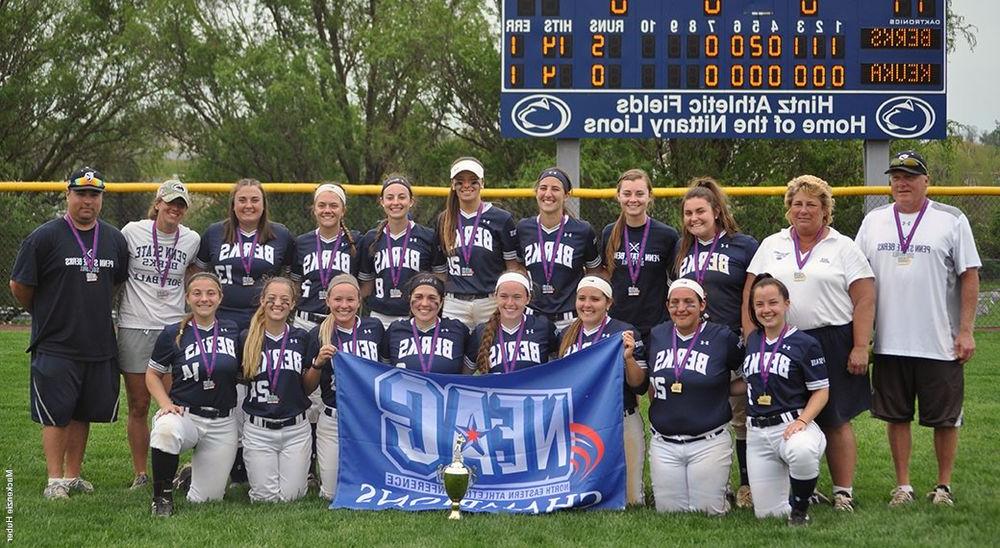Berks Softball team with NEAC Championship flag